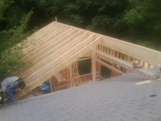 Framing a new roof addition that ties into an existing shingle roof in Manhattan Beach