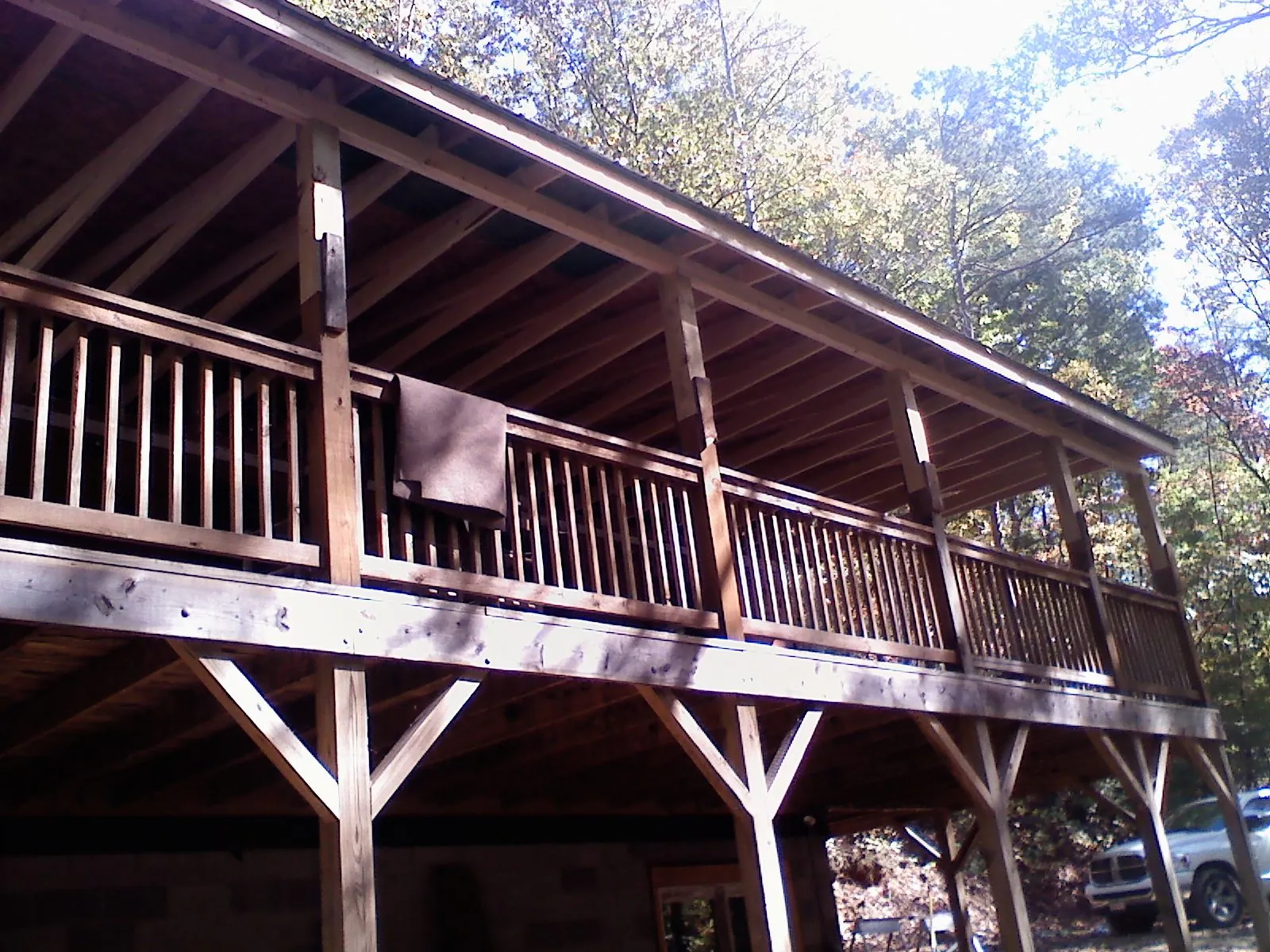 Timber framing under a new elevated porch and deck — Roof Leak Repair in Manhattan Beach by Roofing Brothers